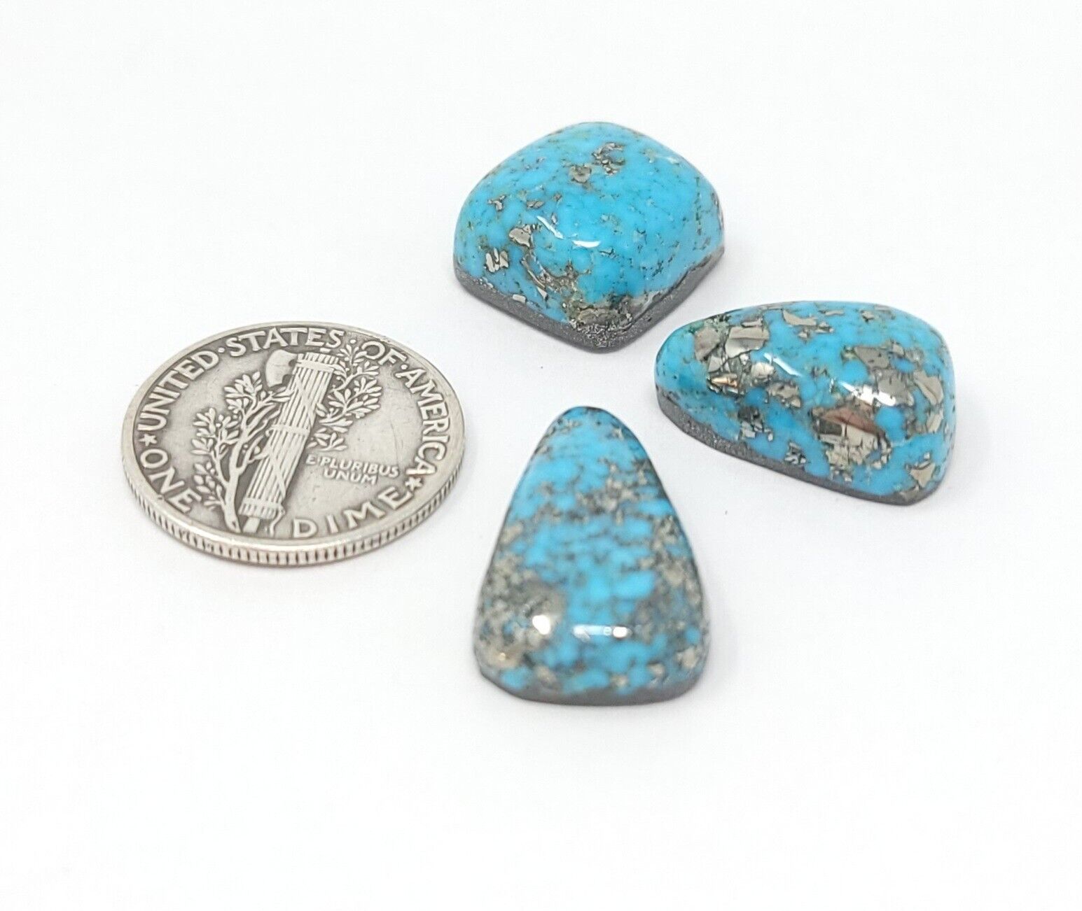 Natural Persian Turquoise Cabs With Pyrite Red Web Cushion Triangle 30.9 Carats